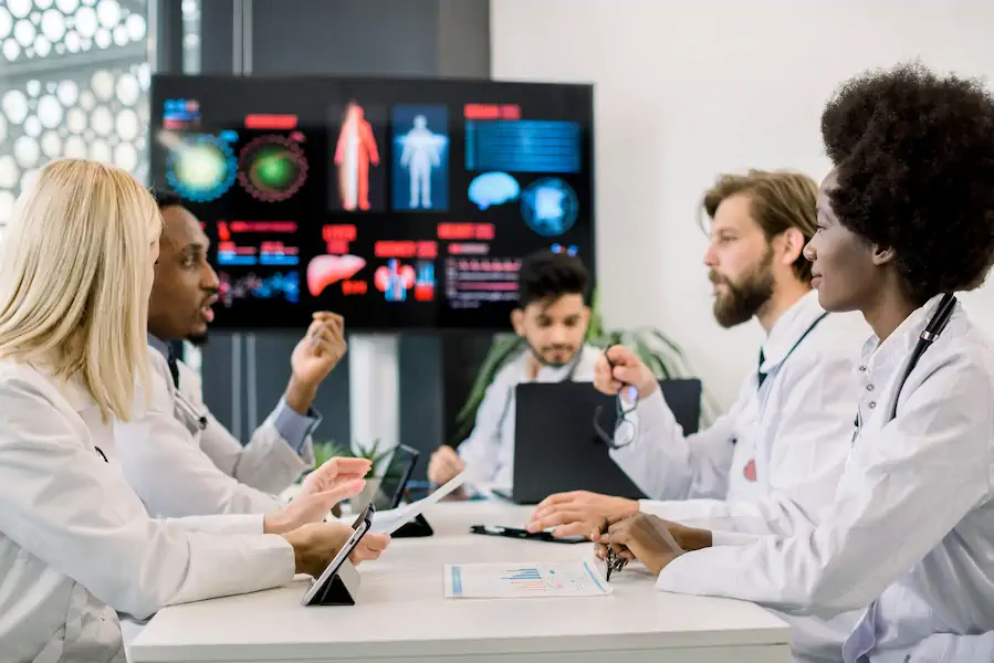 evaluating-value-based-care-solutions Healthcare professionals evaluating value-based care solutions
